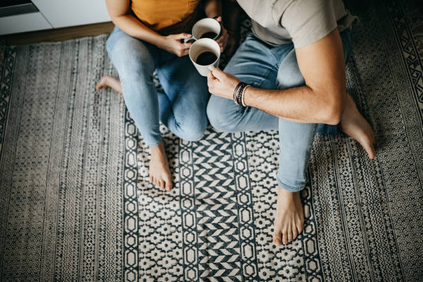 Couple Drinking Coffee | Webb Carpet Company